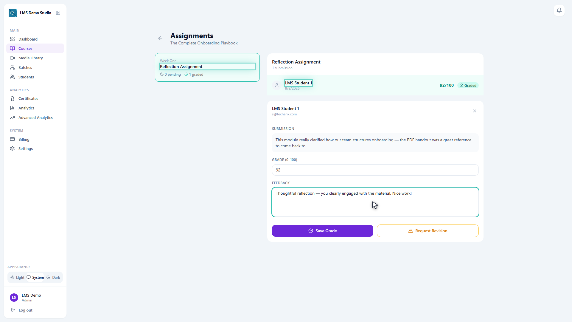Grading a submission — score, written feedback, and a saved grade the student sees instantly